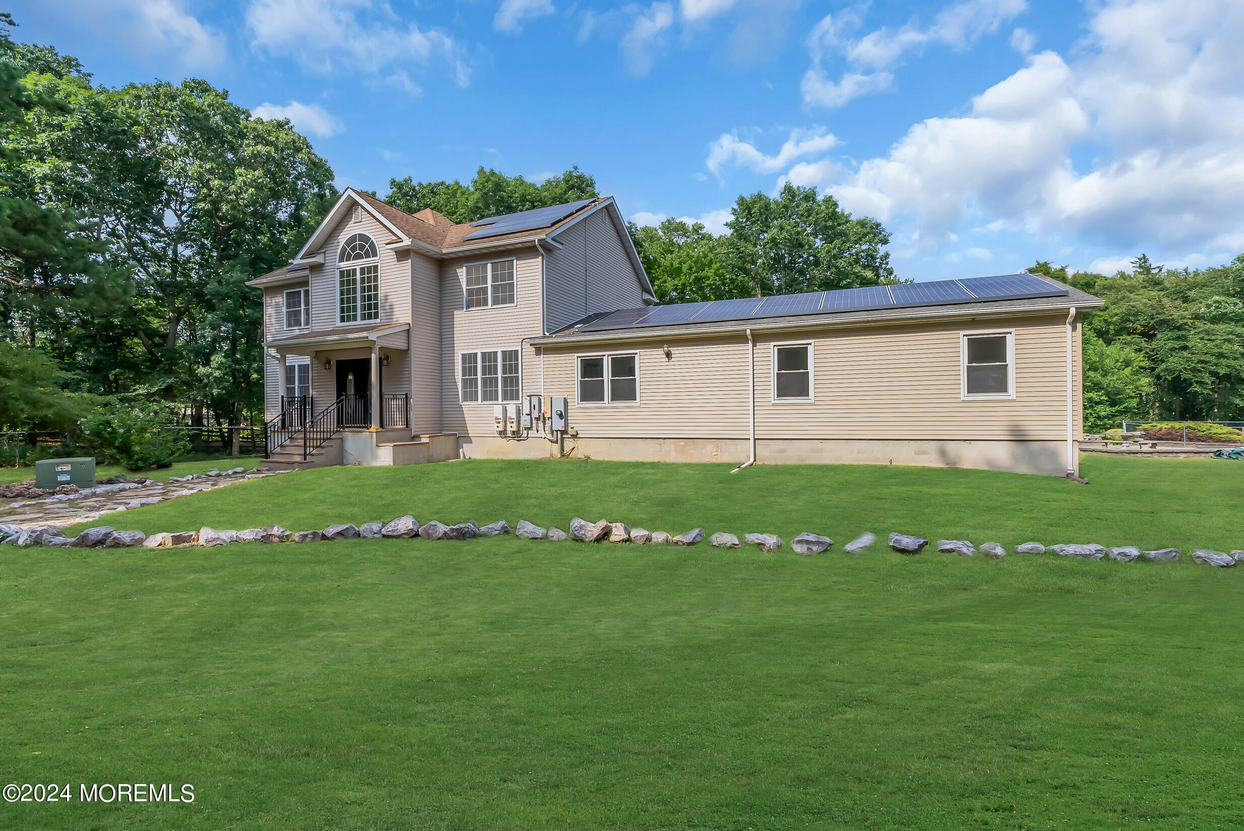 888 Anderson Road Jackson, NJ 08527 - Photo 4 of 81 a front view of house with yard and green space