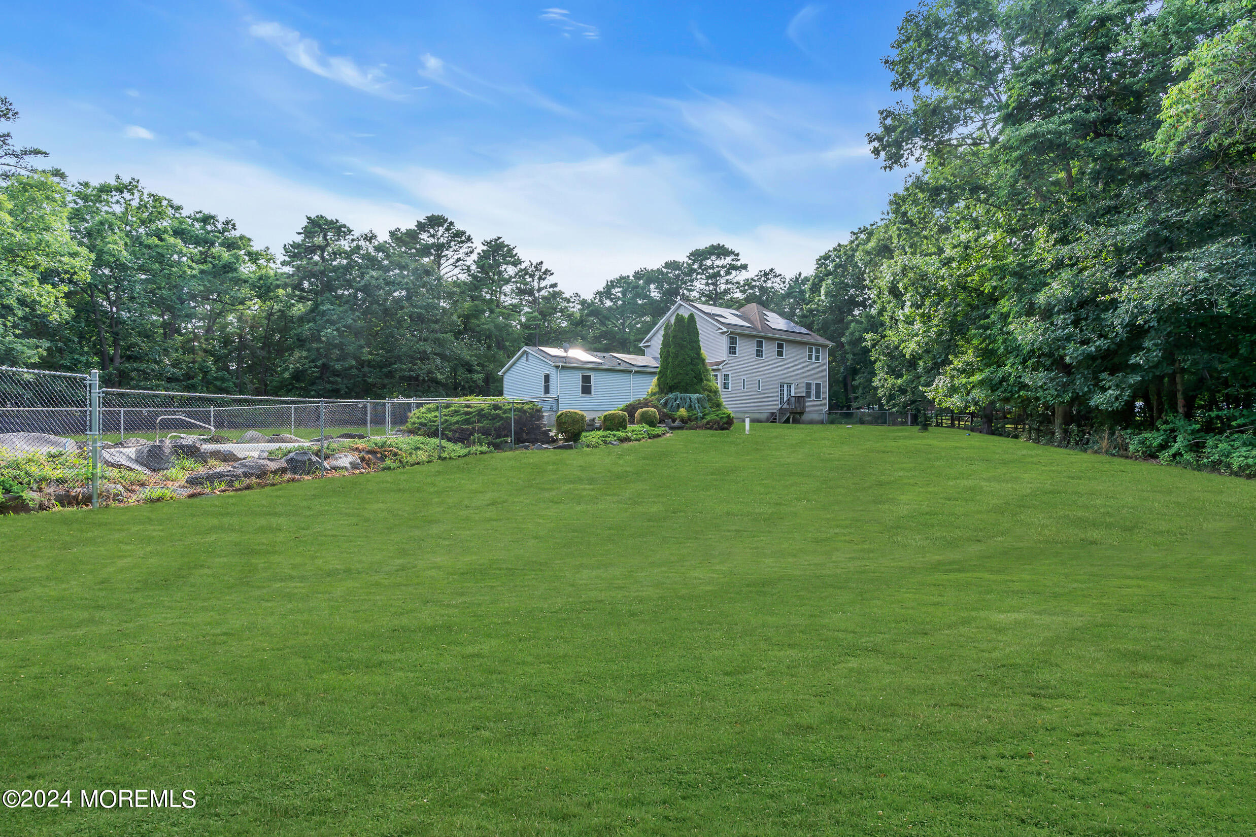 888 Anderson Road Jackson, NJ 08527 - Photo 60 of 81 a backyard of a house with lots of green space