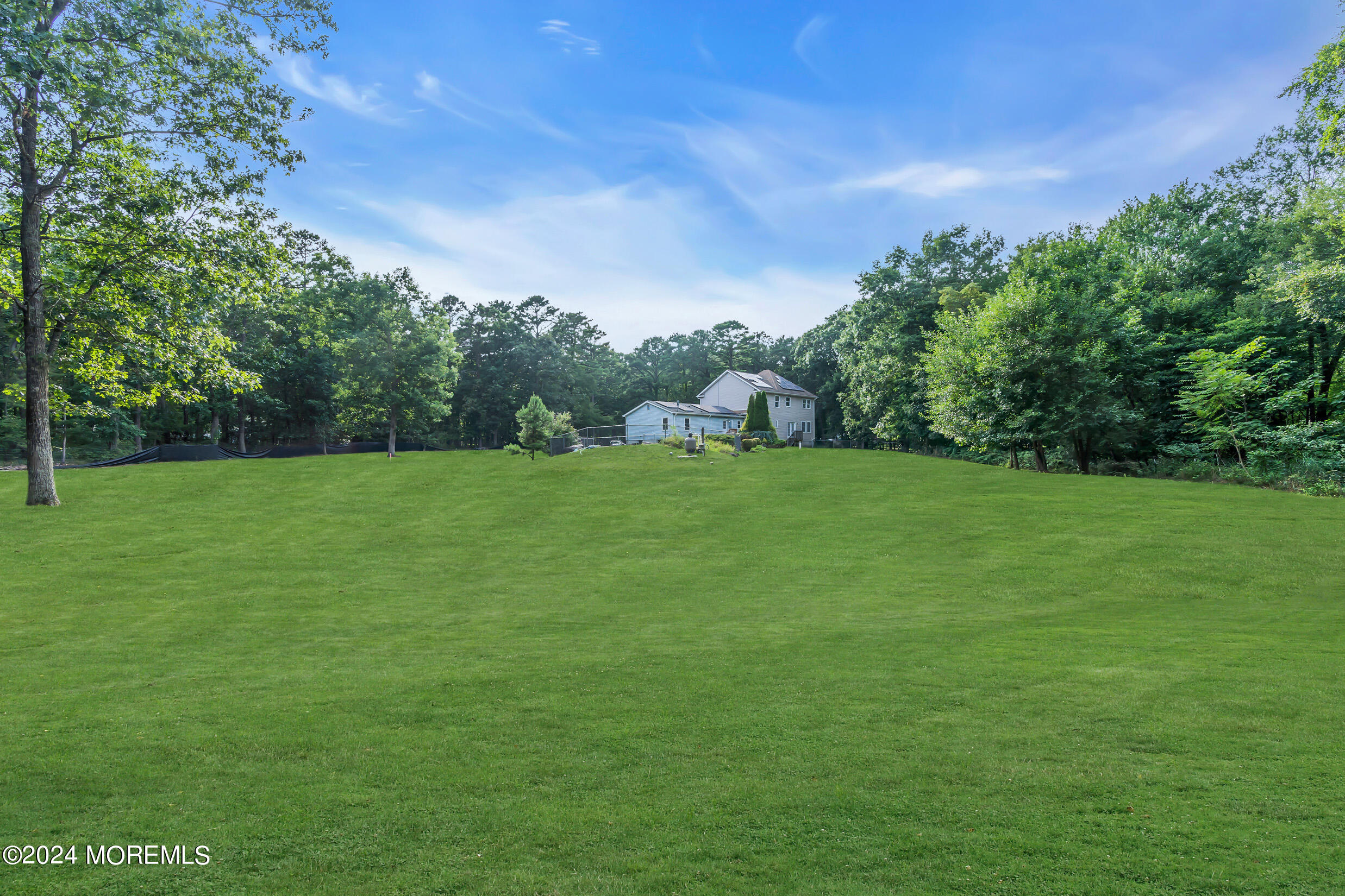 888 Anderson Road Jackson, NJ 08527 - Photo 61 of 81 a backyard of a house with lots of green space
