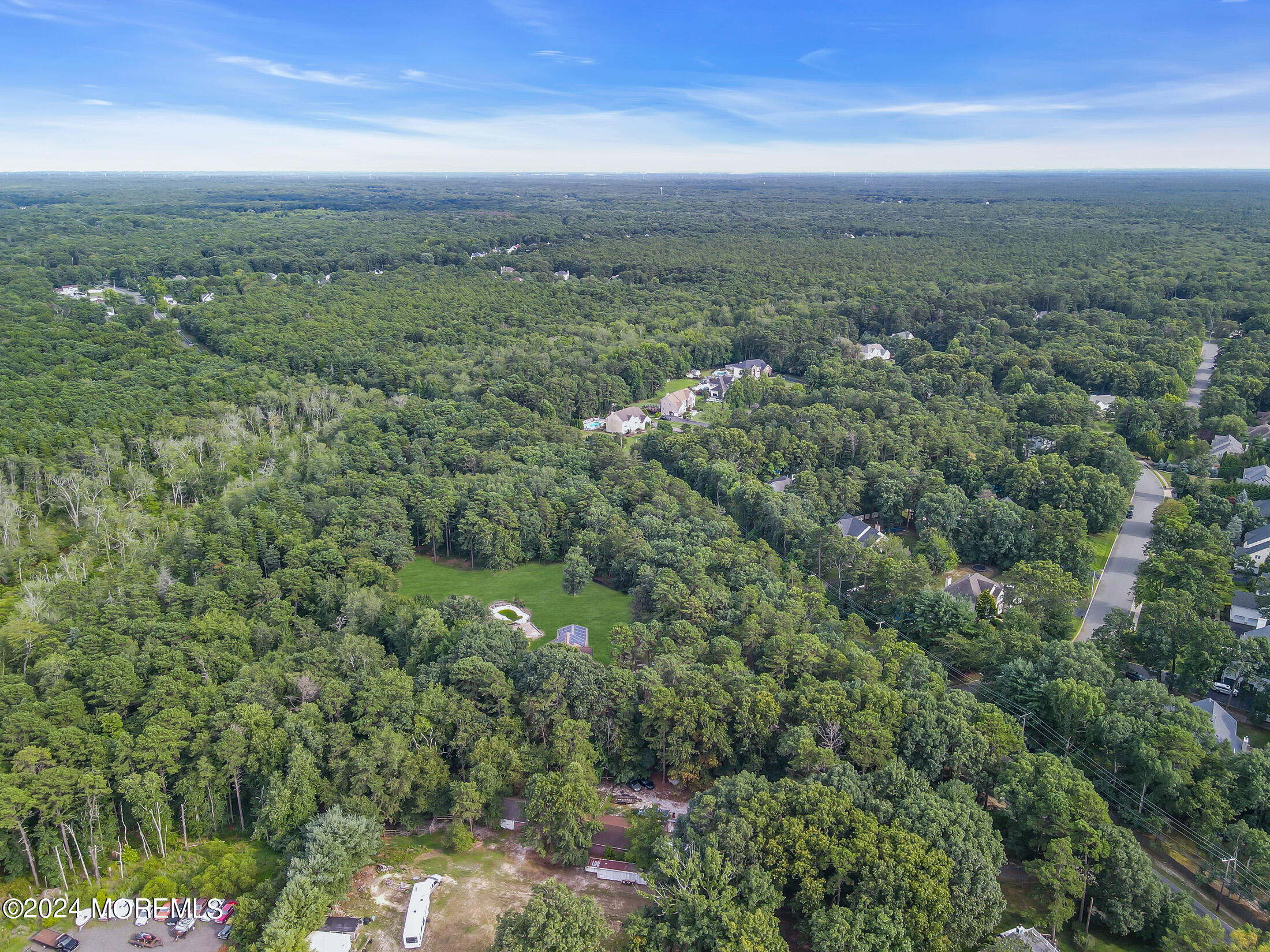 888 Anderson Road Jackson, NJ 08527 - Photo 78 of 81 a view of a city with lush green forest