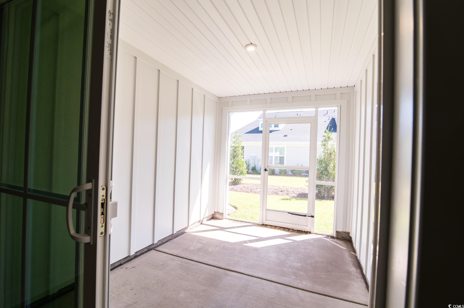2382 Elowen Lane Longs, SC 29568 - Photo 27 of 36 View of unfurnished sunroom