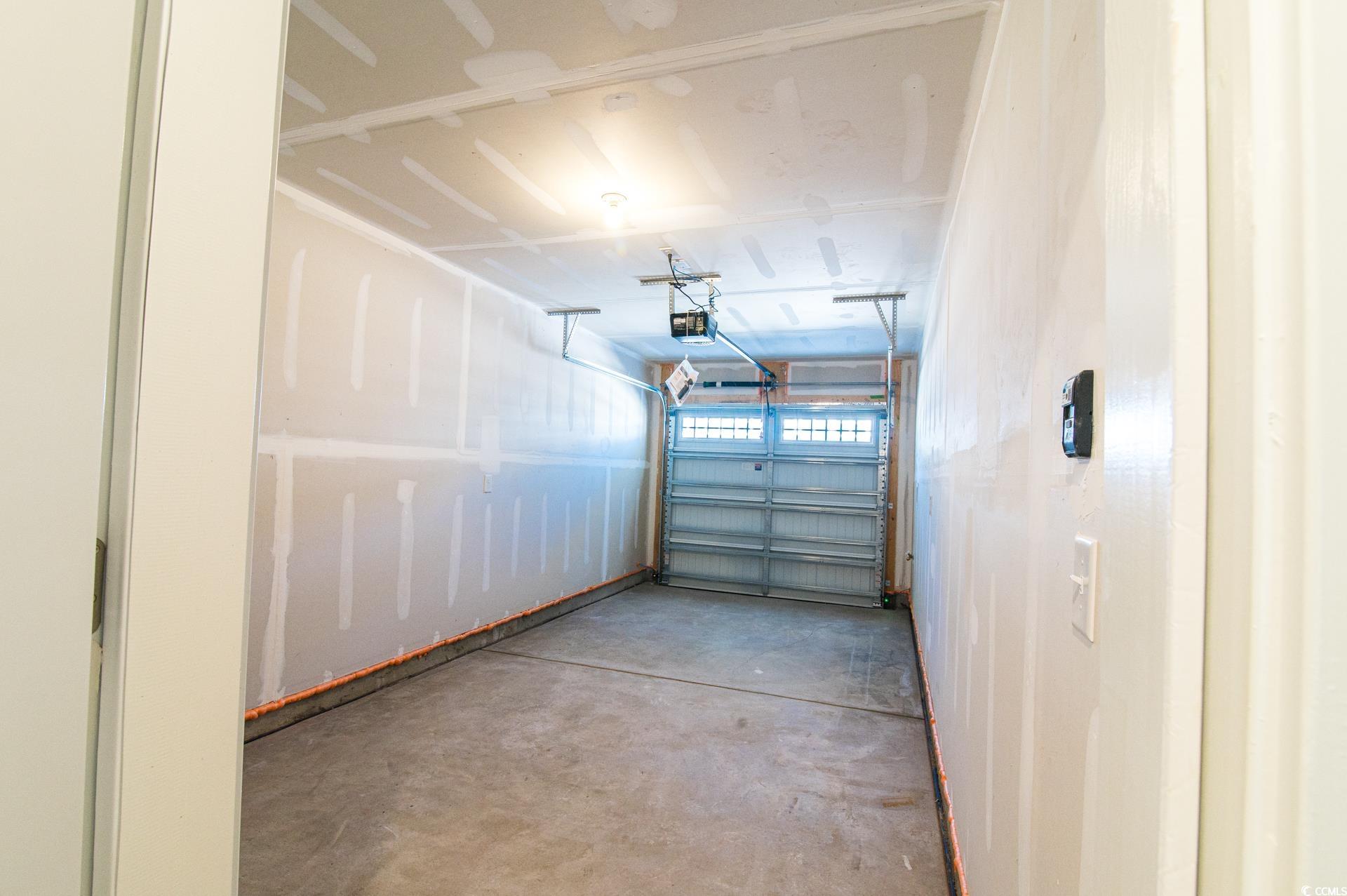 2382 Elowen Lane Longs, SC 29568 - Photo 30 of 36 View of garage