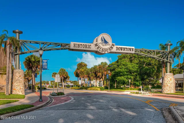 a view of a cafe with sitting area