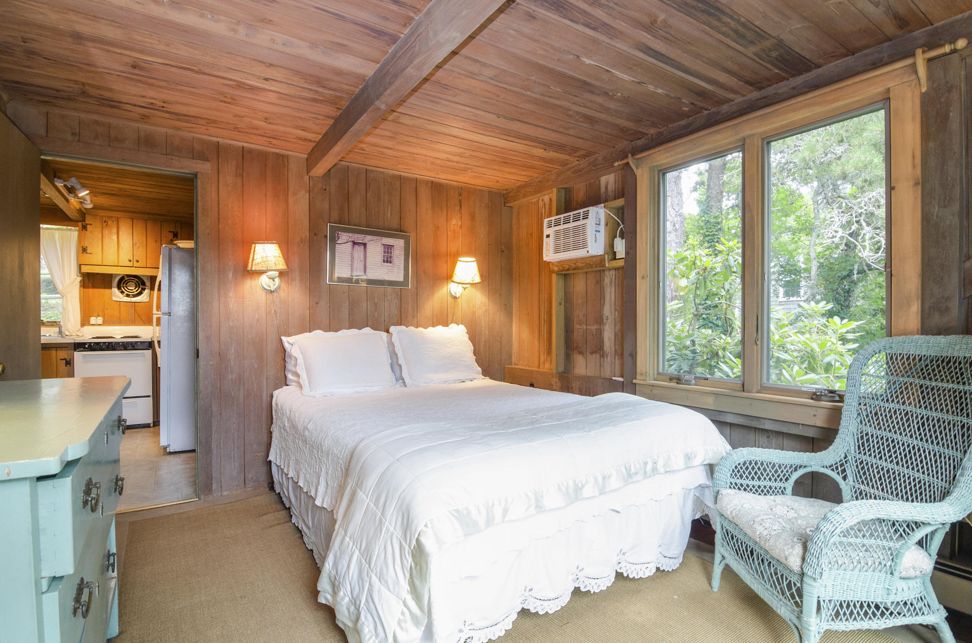 24 Alden Road Orleans, MA 02653 - Photo 11 of 27 a bedroom with a bed and wooden floor