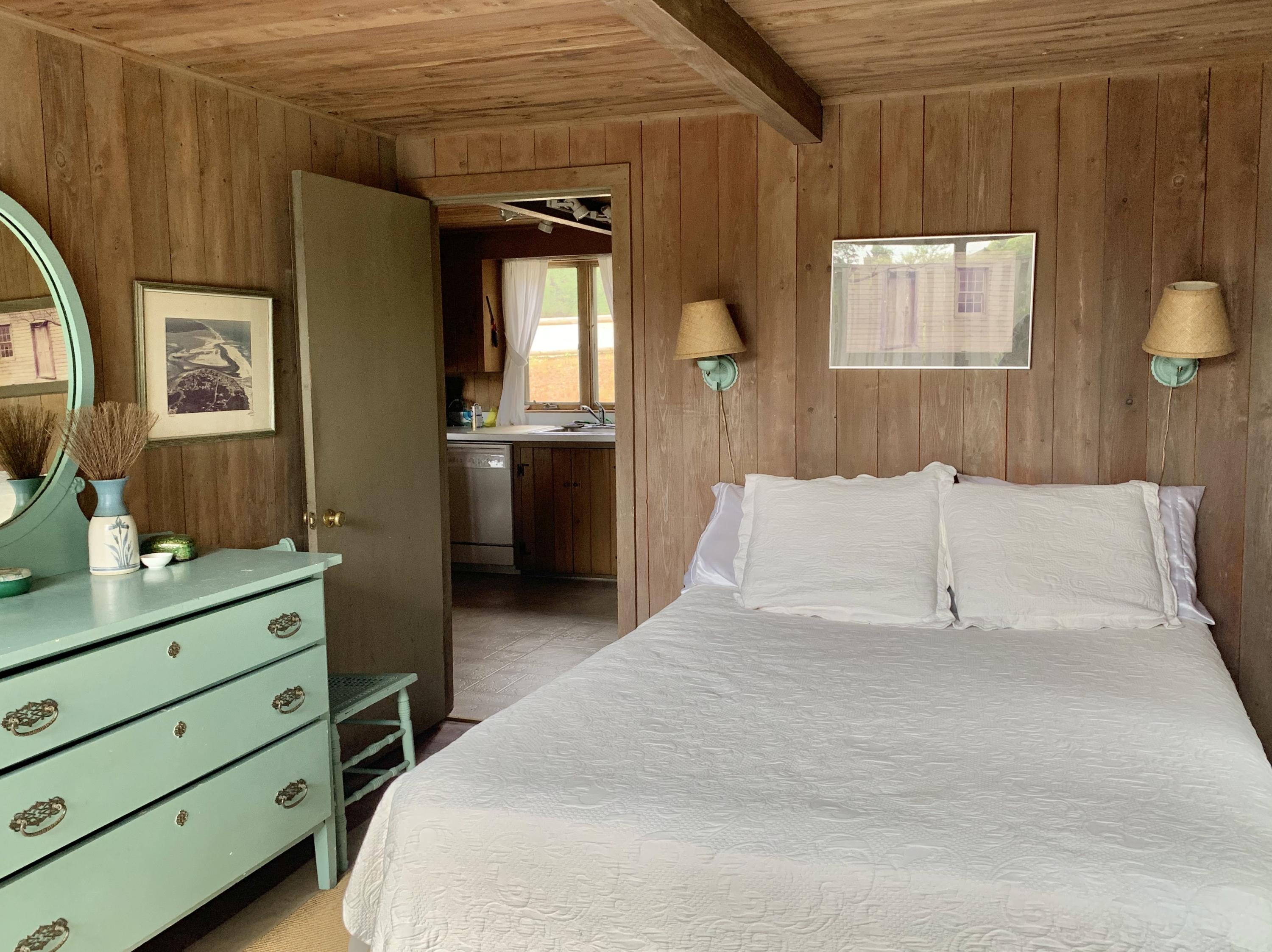 24 Alden Road Orleans, MA 02653 - Photo 12 of 27 a spacious bedroom with a bed and a dresser