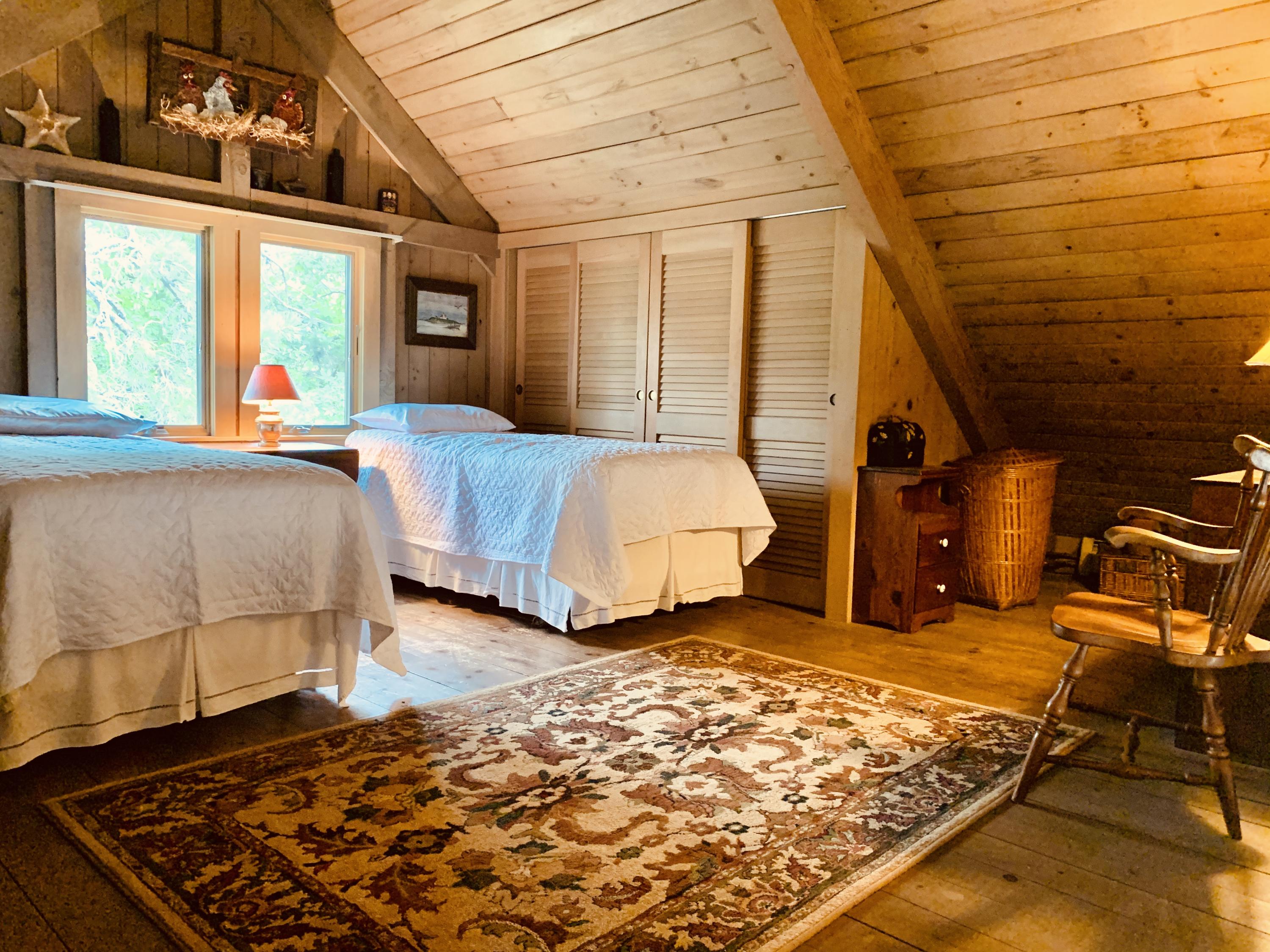 24 Alden Road Orleans, MA 02653 - Photo 14 of 27 a bedroom with bed and window