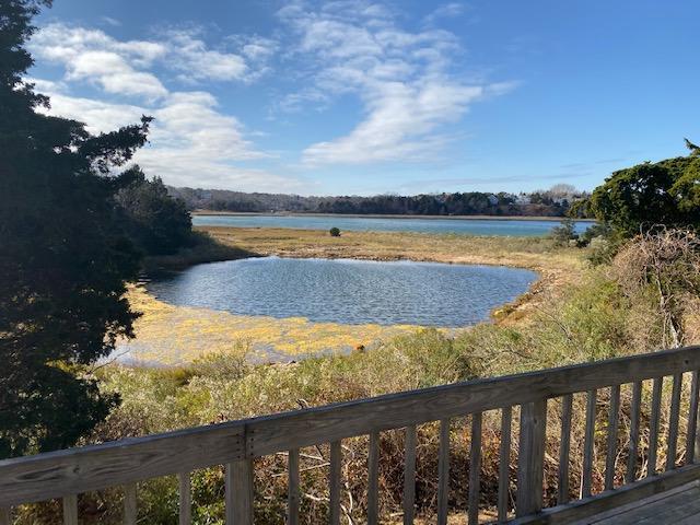 24 Alden Road Orleans, MA 02653 - Photo 2 of 27 a view of ocean from a balcony
