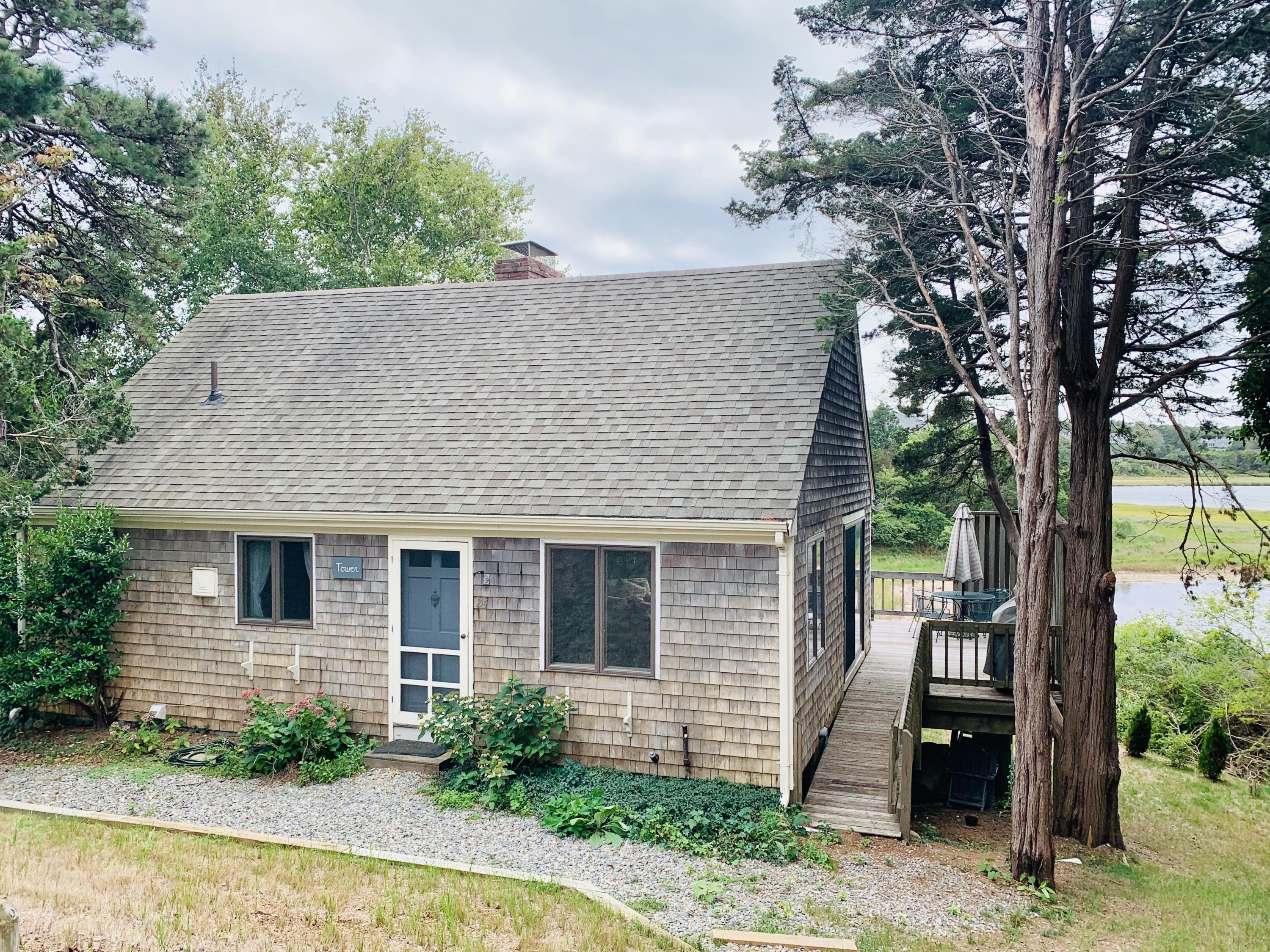 24 Alden Road Orleans, MA 02653 - Photo 26 of 27 a front view of a house with garden