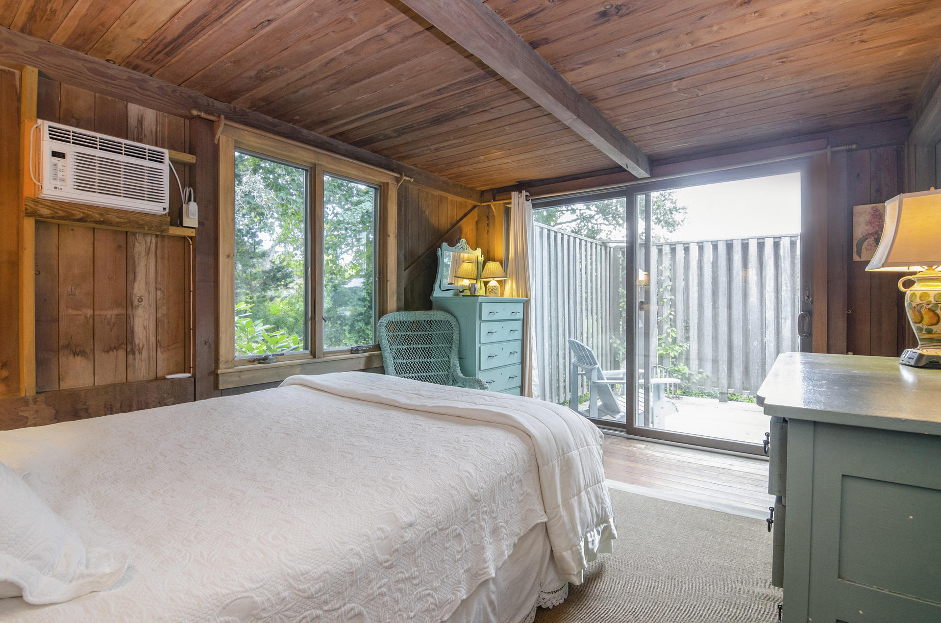 24 Alden Road Orleans, MA 02653 - Photo 10 of 27 a bedroom with a bed and a large window