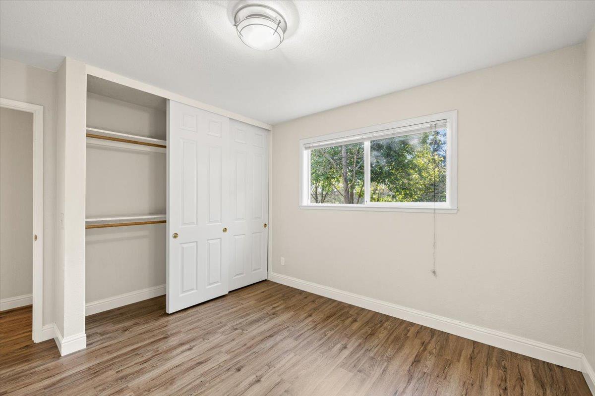 6318 David Avenue Loomis, CA 95650 - Photo 21 of 26 wooden floor in an empty room with a window