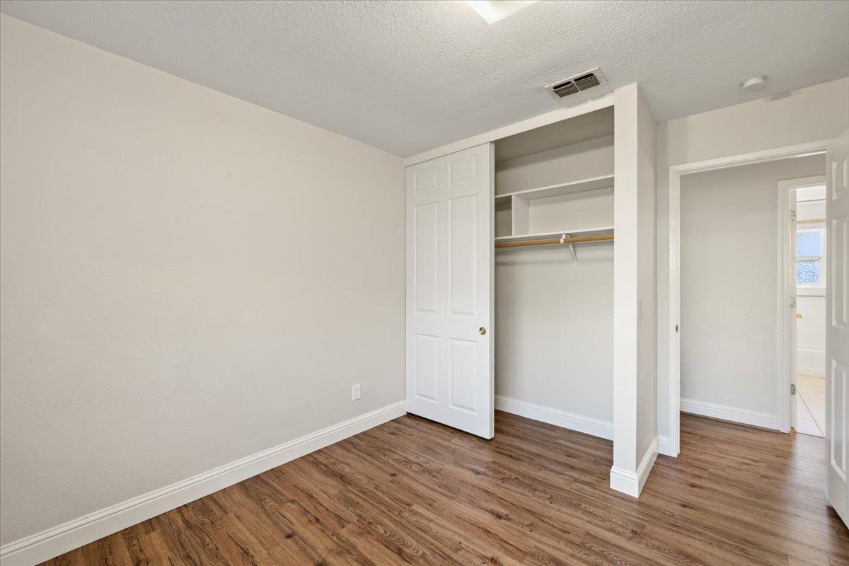 6318 David Avenue Loomis, CA 95650 - Photo 25 of 26 a view of an empty room with wooden floor
