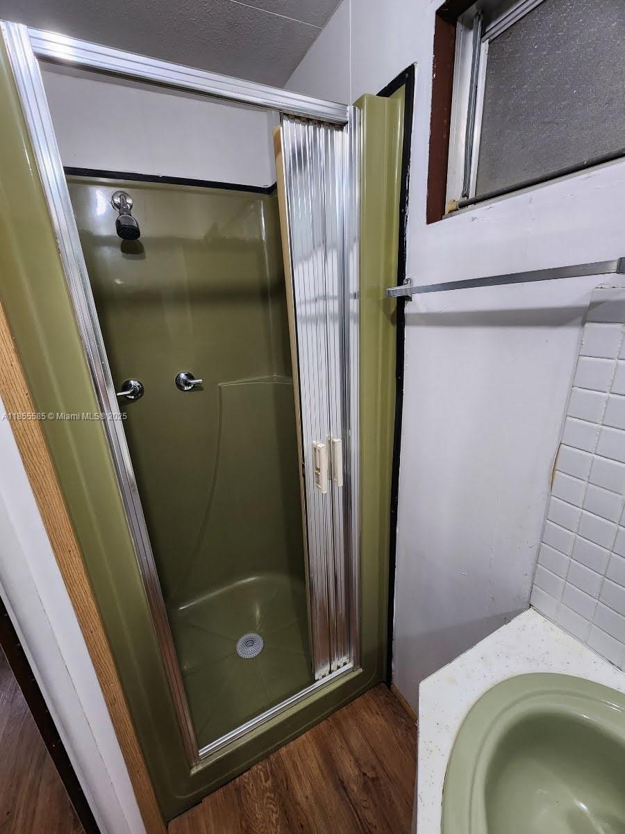 1590 Southwest 65th Terrace, Unit H Boca Raton, FL 33428 - Photo 14 of 17 a bathroom with a tub and toilet