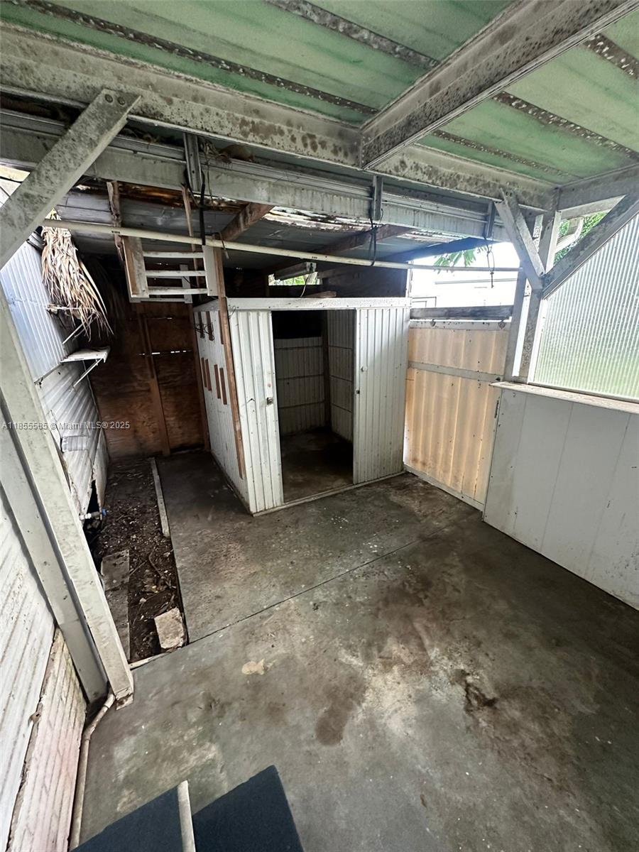 1590 Southwest 65th Terrace, Unit H Boca Raton, FL 33428 - Photo 16 of 17 a view of a garage