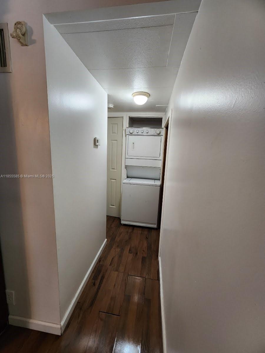 1590 Southwest 65th Terrace, Unit H Boca Raton, FL 33428 - Photo 7 of 17 a view of hallway with wooden floor