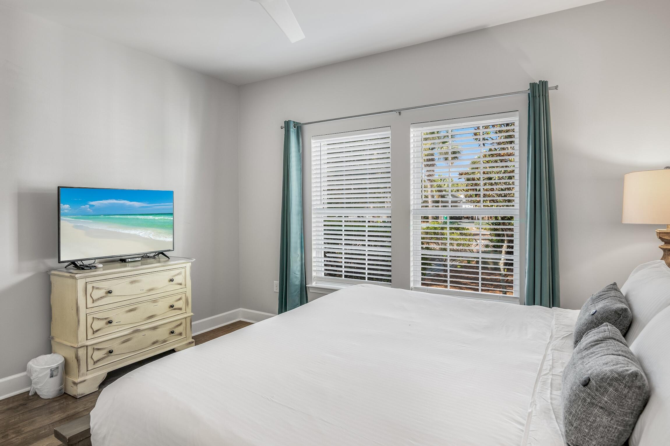 58 Gulf Cove Court Santa Rosa Beach, FL 32459 - Photo 11 of 29 a bedroom with a bed and a television