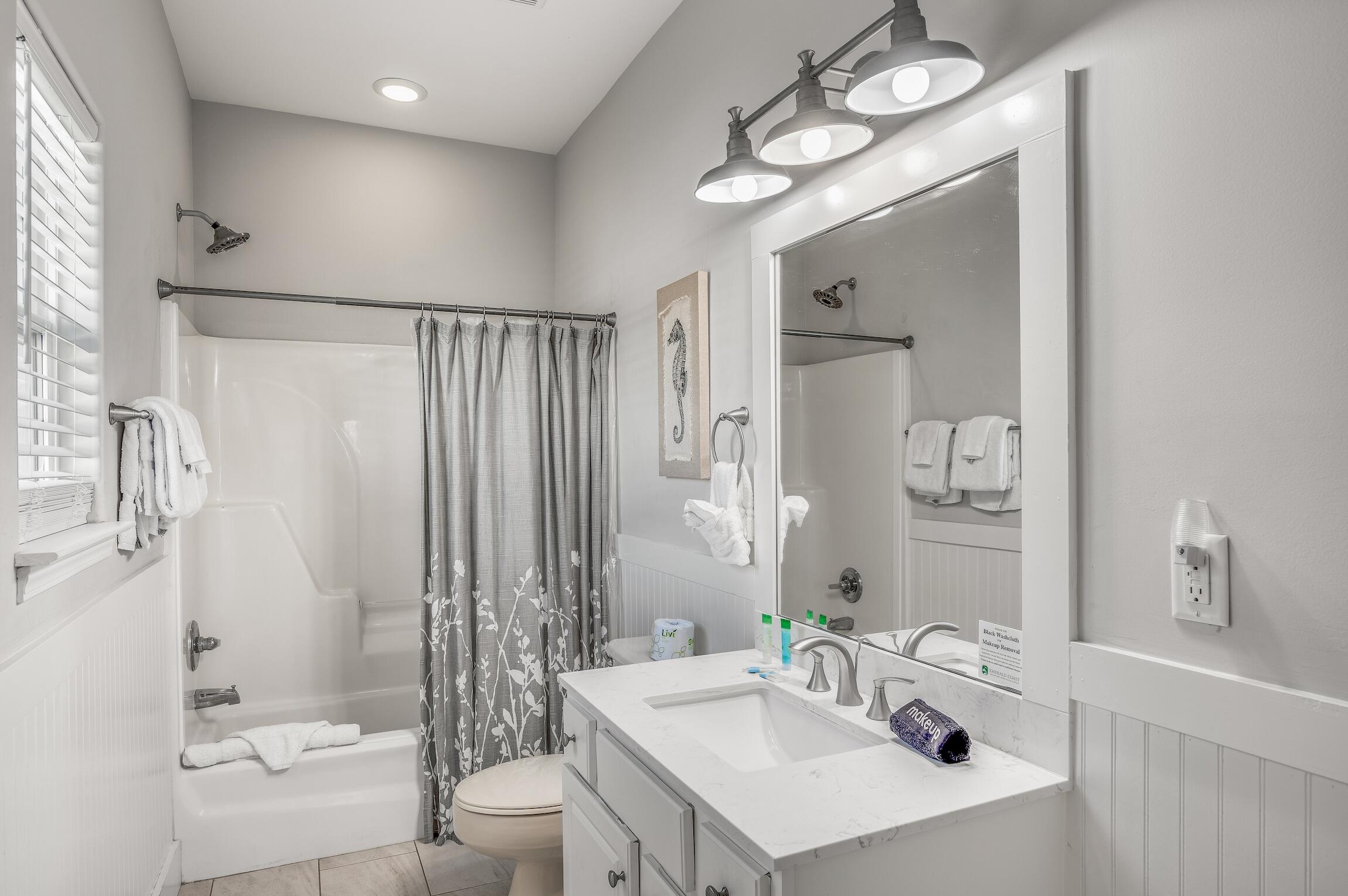 58 Gulf Cove Court Santa Rosa Beach, FL 32459 - Photo 12 of 29 a bathroom with a sink a toilet and shower