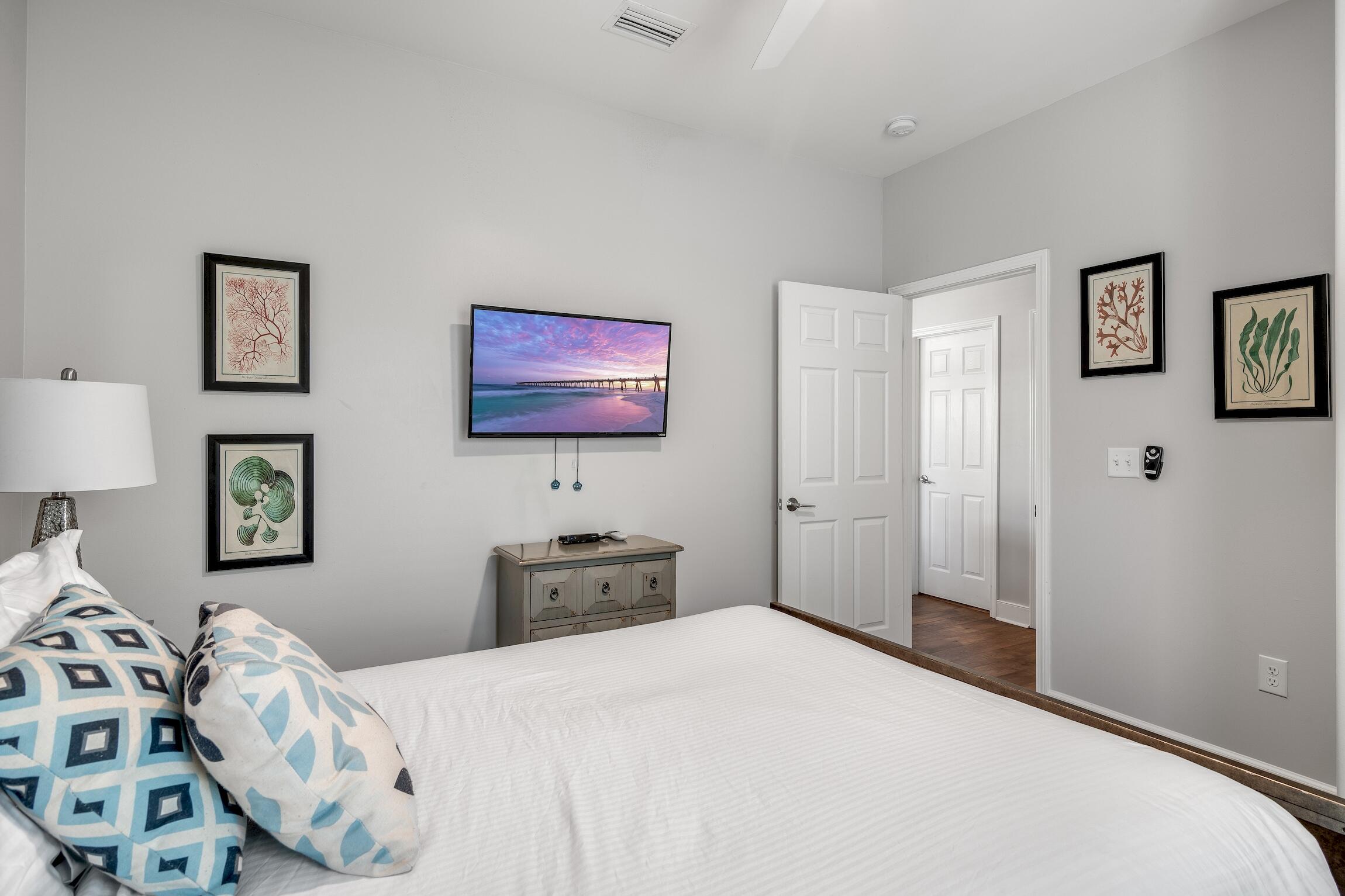 58 Gulf Cove Court Santa Rosa Beach, FL 32459 - Photo 14 of 29 a bedroom with a bed and a dresser in it