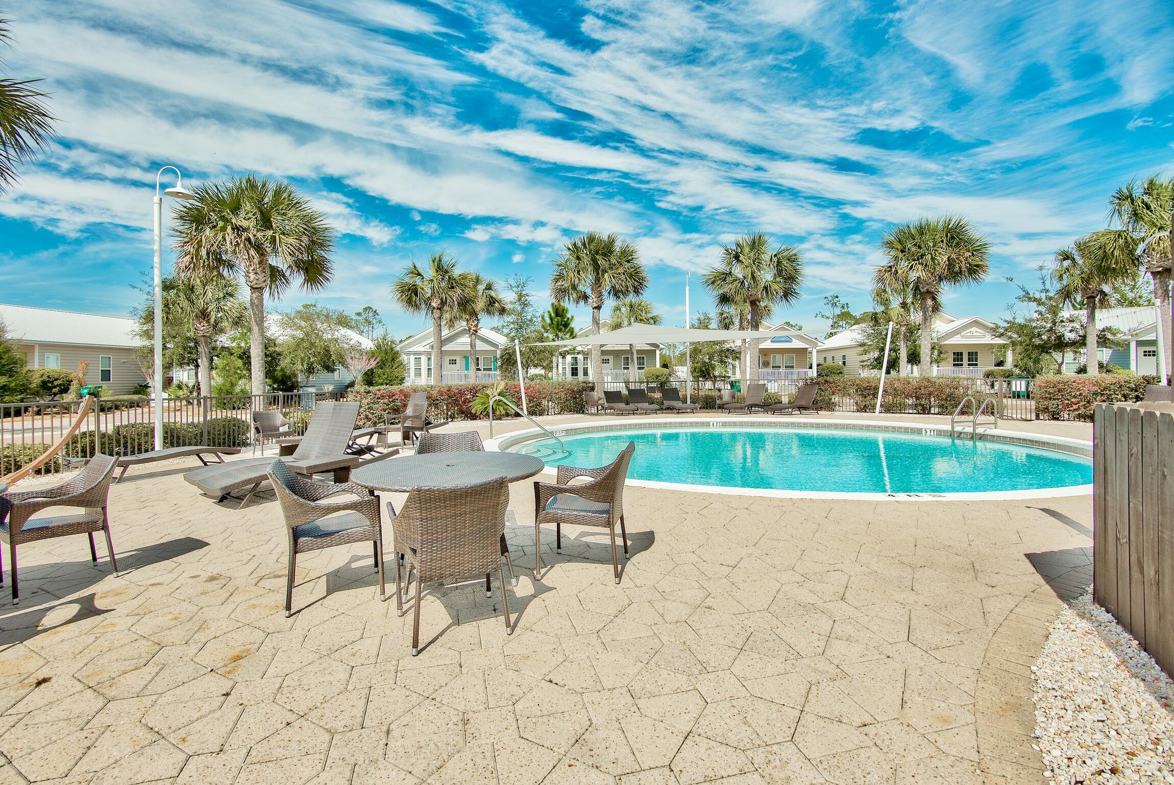 58 Gulf Cove Court Santa Rosa Beach, FL 32459 - Photo 20 of 29 a view of a terrace with sitting area
