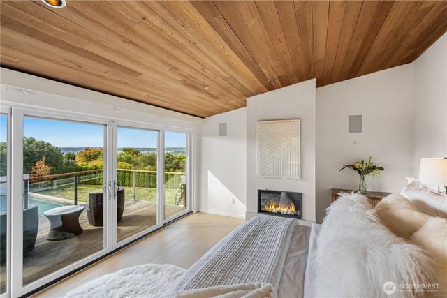 a bed room with a bed and a fireplace