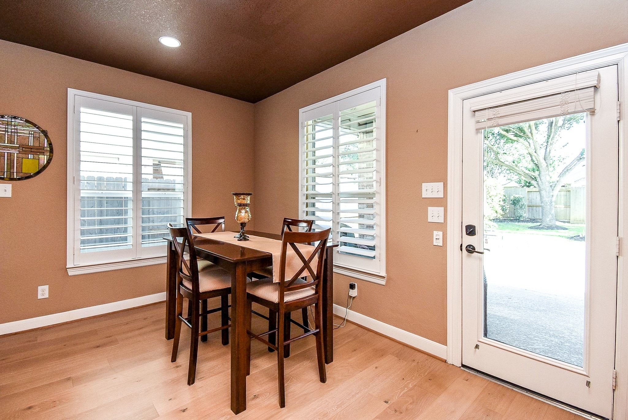27607 Macklind Ridge Lane Katy, TX 77494 - Photo 27 of 50 Breakfast room with plantation shutters and great views of the backyard.
