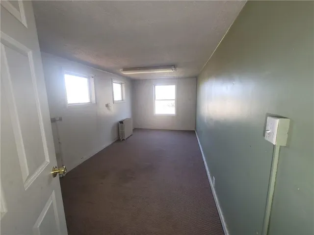 a view of a livingroom with a staircase