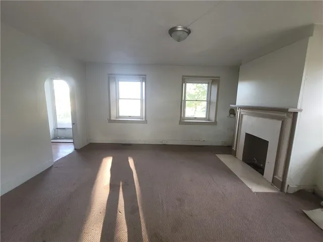 an empty room with windows