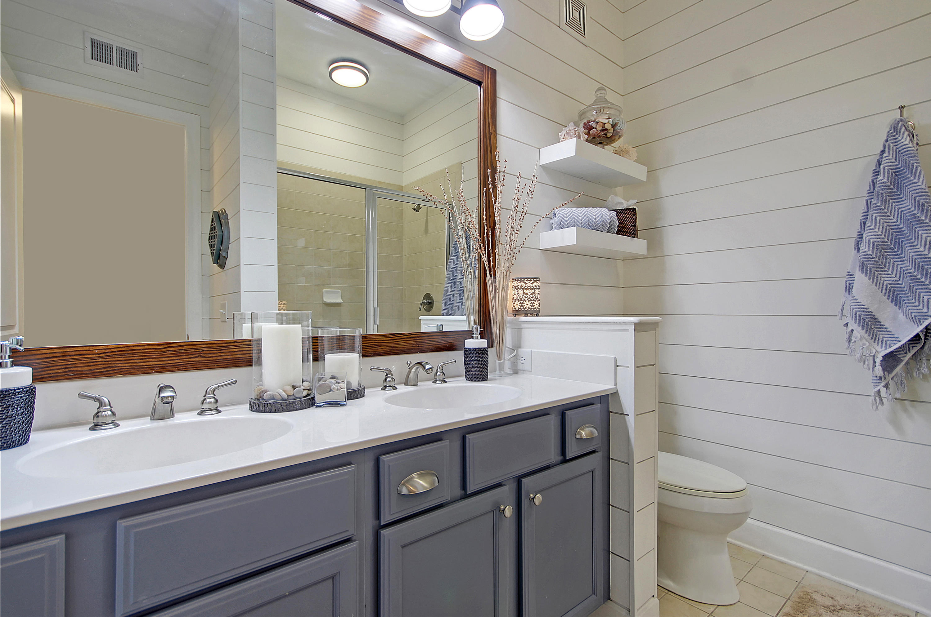 135 Pier View Street, Unit 101 Charleston, SC 29492 - Photo 23 of 45 Guest Bathroom with Shiplap Walls