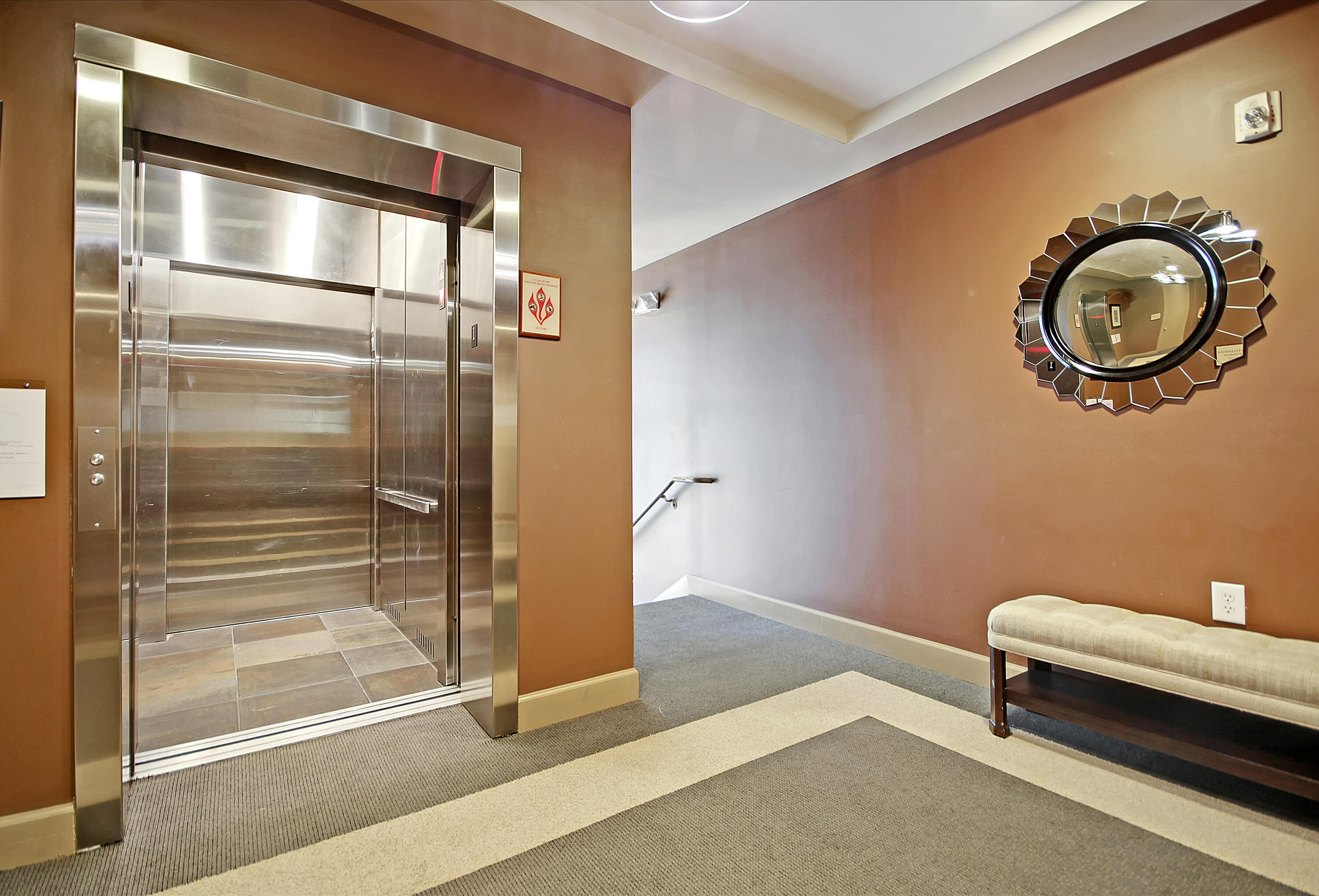 135 Pier View Street, Unit 101 Charleston, SC 29492 - Photo 30 of 45 Elevators down to Parking Garage