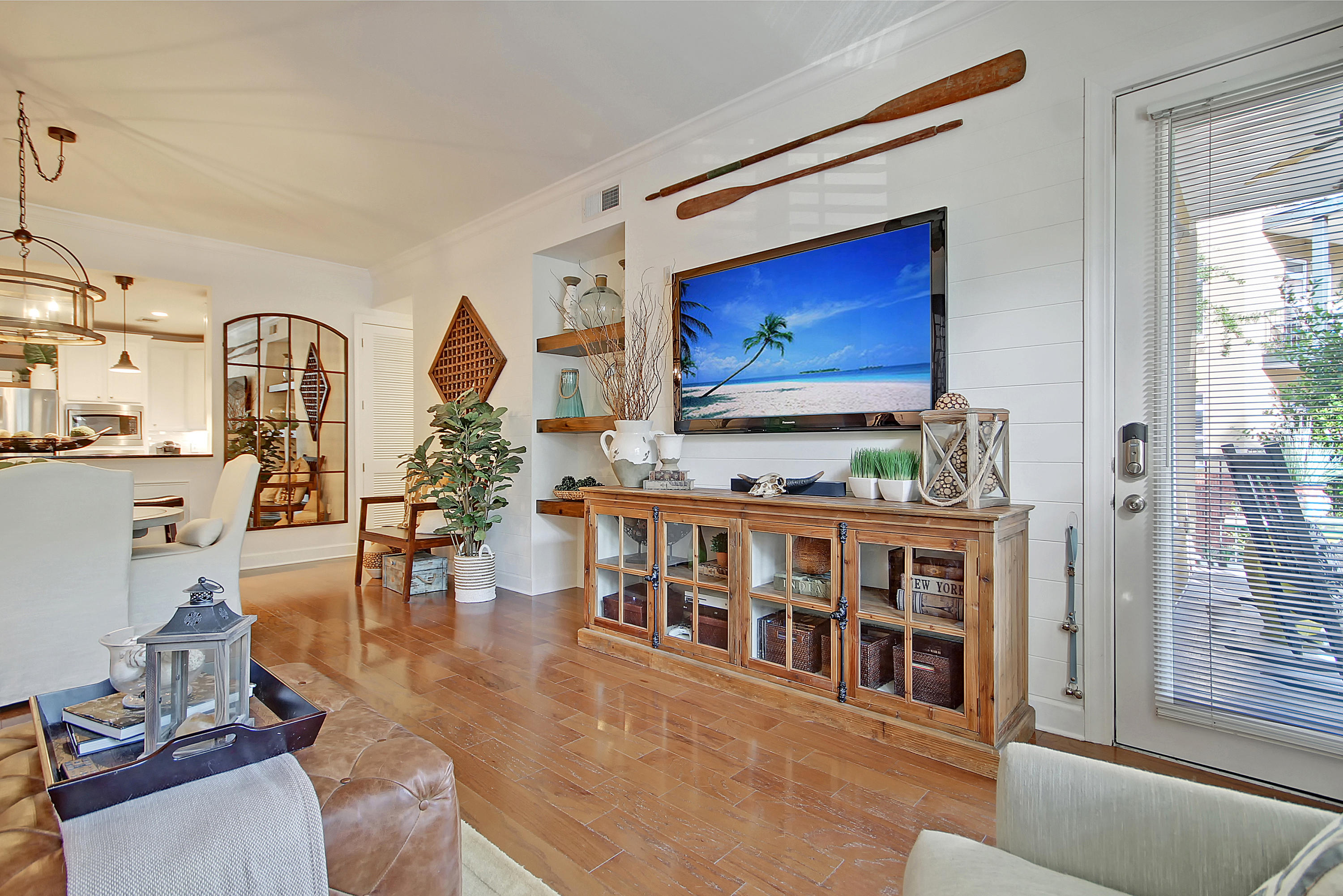 135 Pier View Street, Unit 101 Charleston, SC 29492 - Photo 7 of 45 Family Room with Shiplap Accent Wall