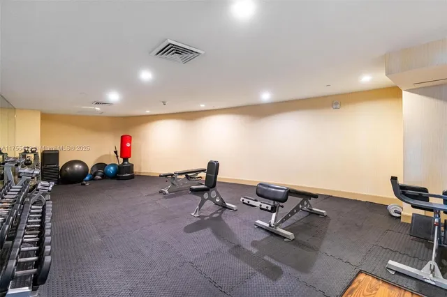 a view of a room with gym equipment