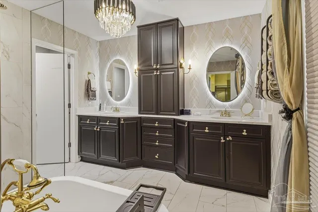 a bathroom with a double vanity sink and a mirror