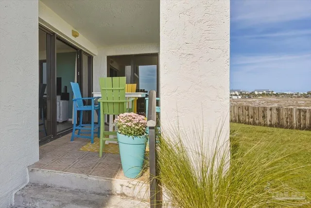 a view of a balcony with chair