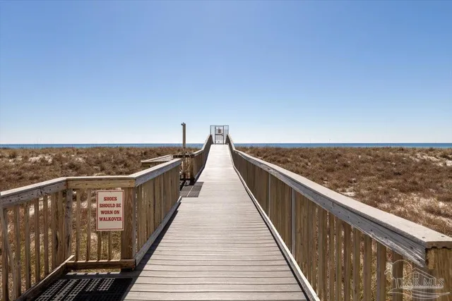 a view of a room with a wooden floor