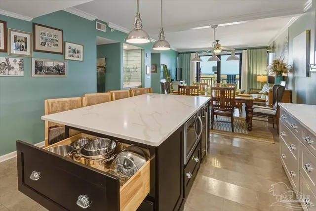 a kitchen with a stove and a table