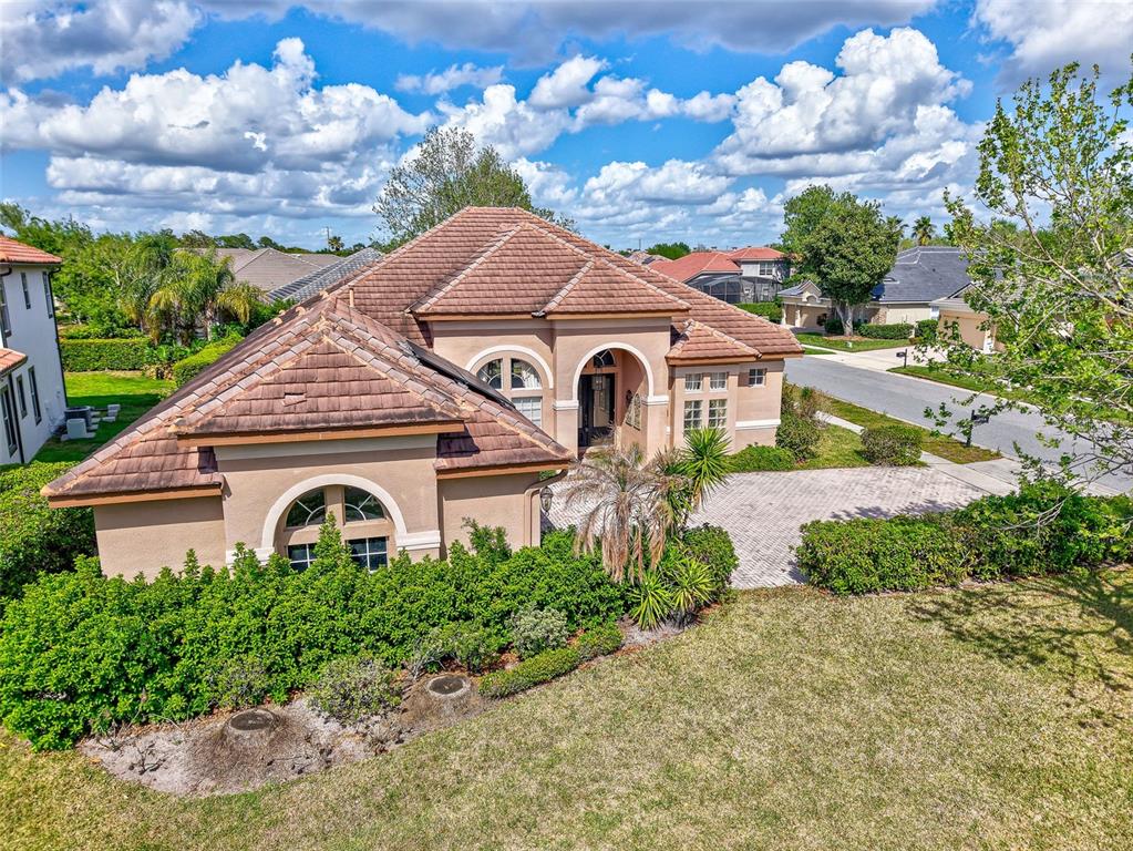 918 Algare Loop Windermere, FL 34786 - Photo 70 of 73 a front view of a house with a yard