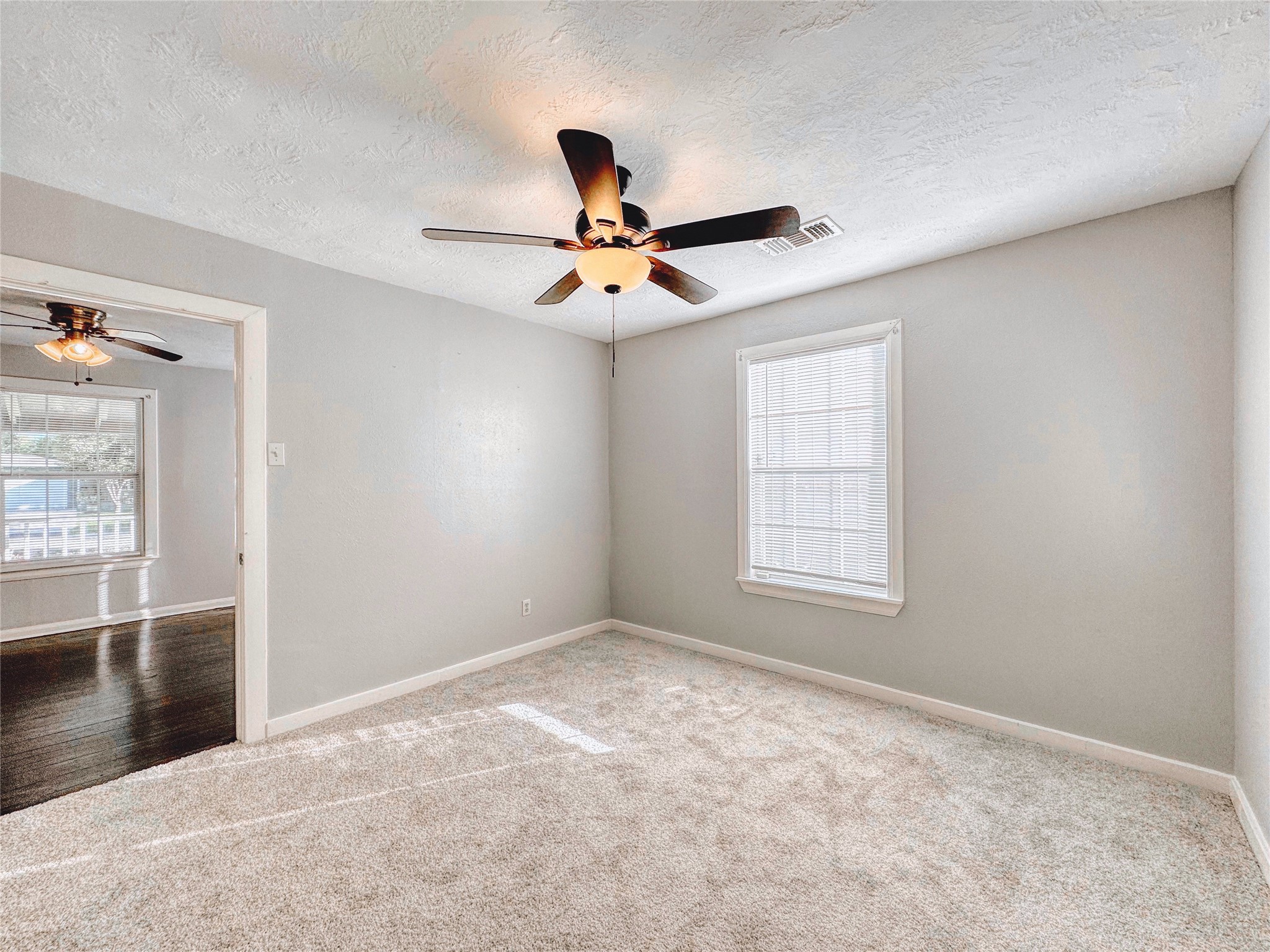 6714 Dillon Street Houston, TX 77061 - Photo 17 of 20 a view of an empty room with a window
