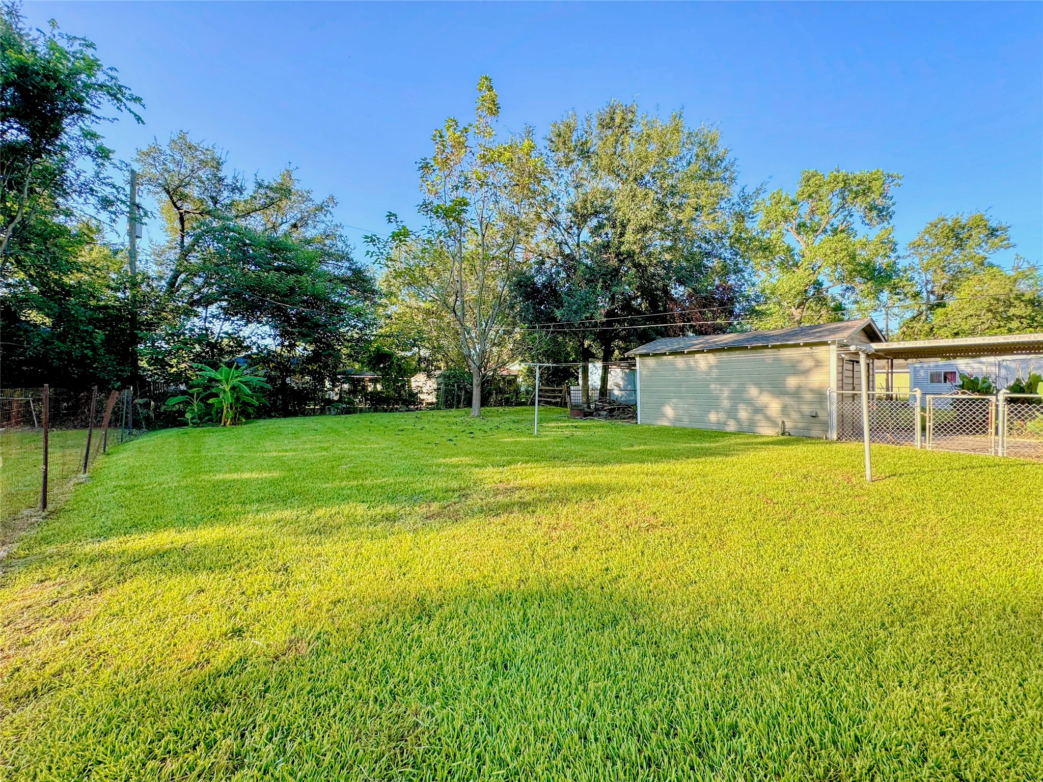 6714 Dillon Street Houston, TX 77061 - Photo 18 of 20 a view of a swimming pool with a yard