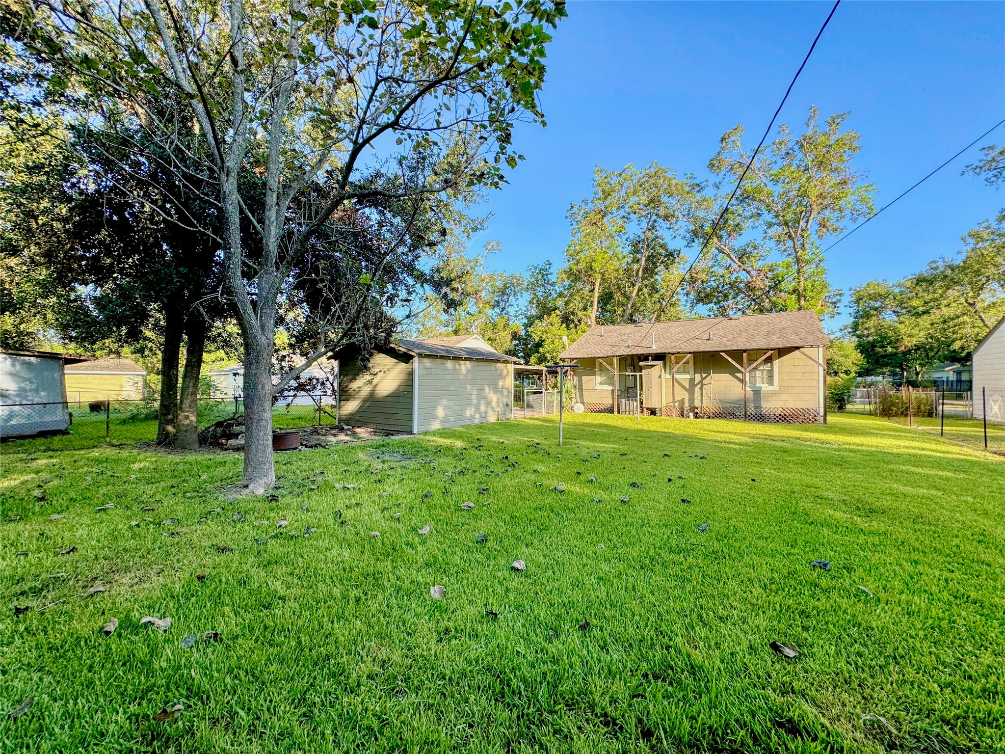 6714 Dillon Street Houston, TX 77061 - Photo 19 of 20 a view of a house with a yard