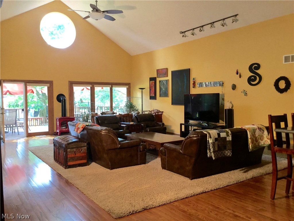 7229 Red Brush Road Ravenna, OH 44266 - Photo 3 of 22 In Law/Tenant Suite With Expansive Ceiling, Hardwood Floors, and Doors To Deck Running Across The Entire
Back Of The Home. Entertain Your Many Guests In Sheer Beauty.
