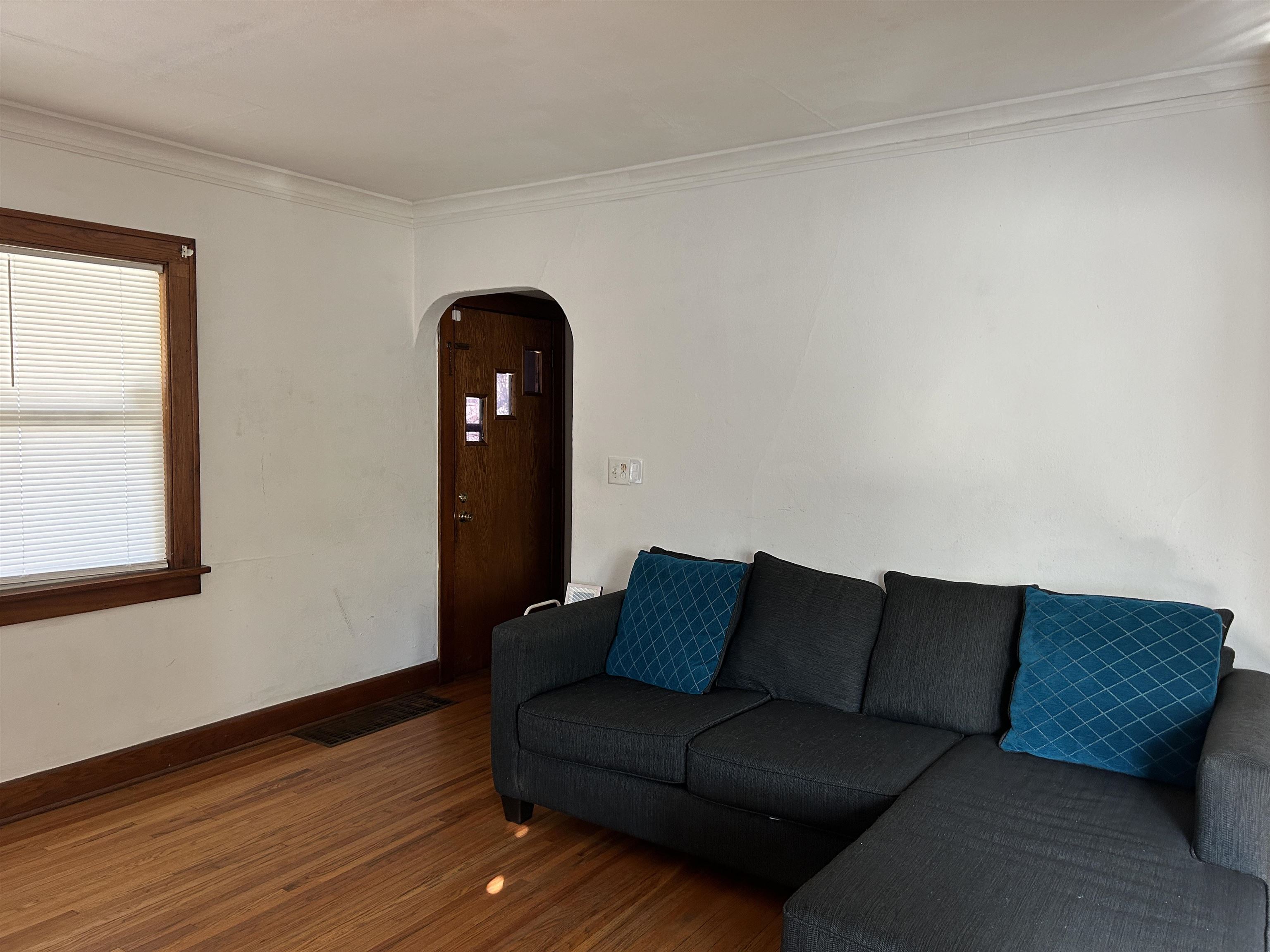1707 Ridge Avenue Rockford, IL 61103 - Photo 6 of 33 a living room with furniture and a wooden floor