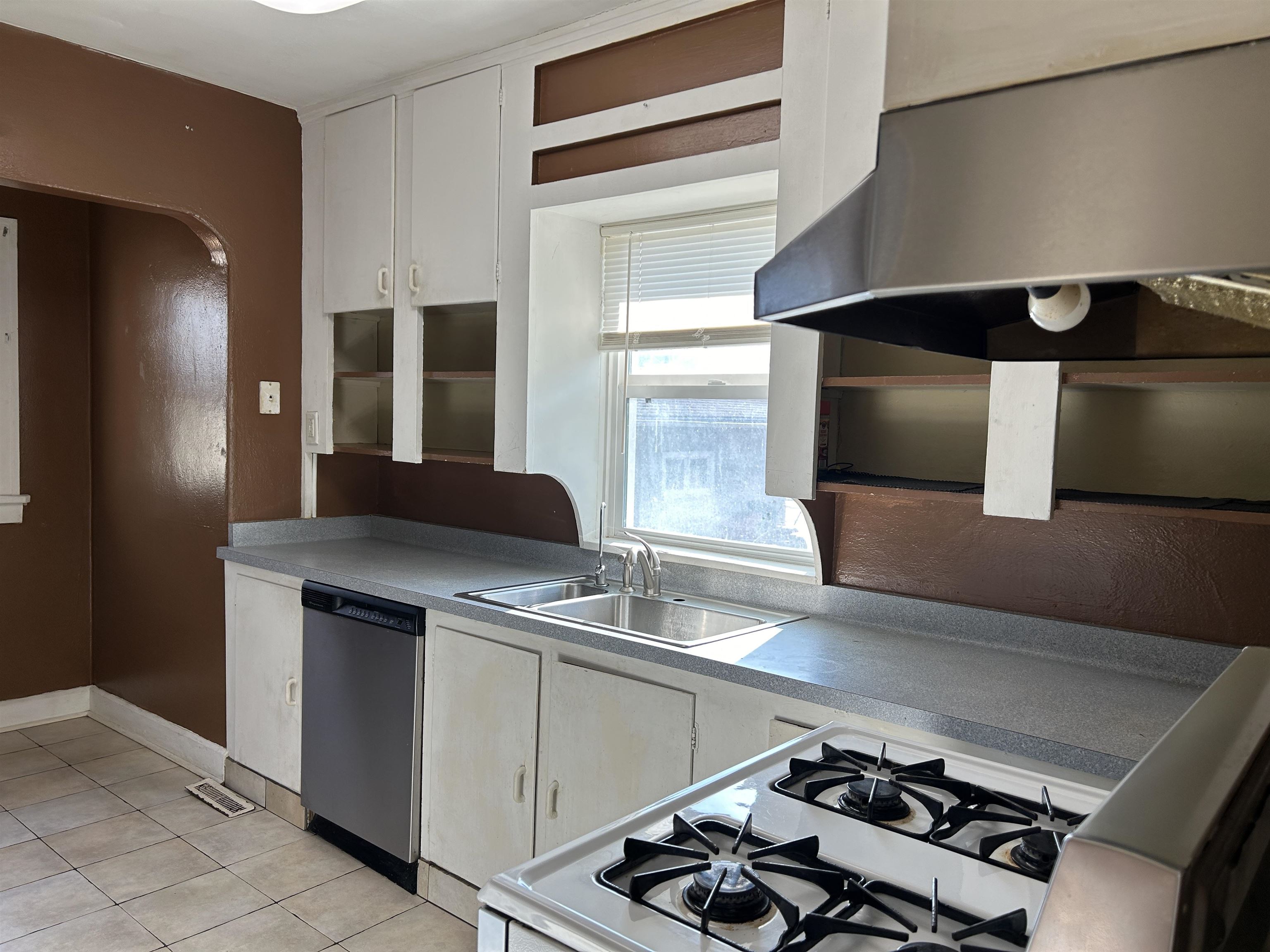 1707 Ridge Avenue Rockford, IL 61103 - Photo 9 of 33 a kitchen with a sink and a stove