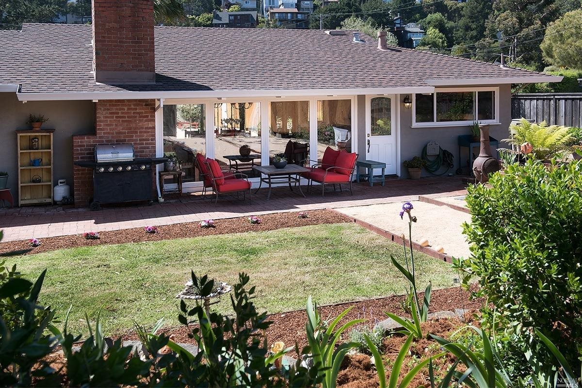 a view of a house with entertaining space