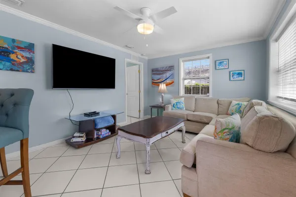 a bathroom with a tub shower and sink