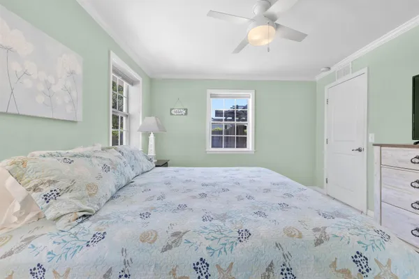 a kitchen with stainless steel appliances a stove a sink a microwave and cabinets