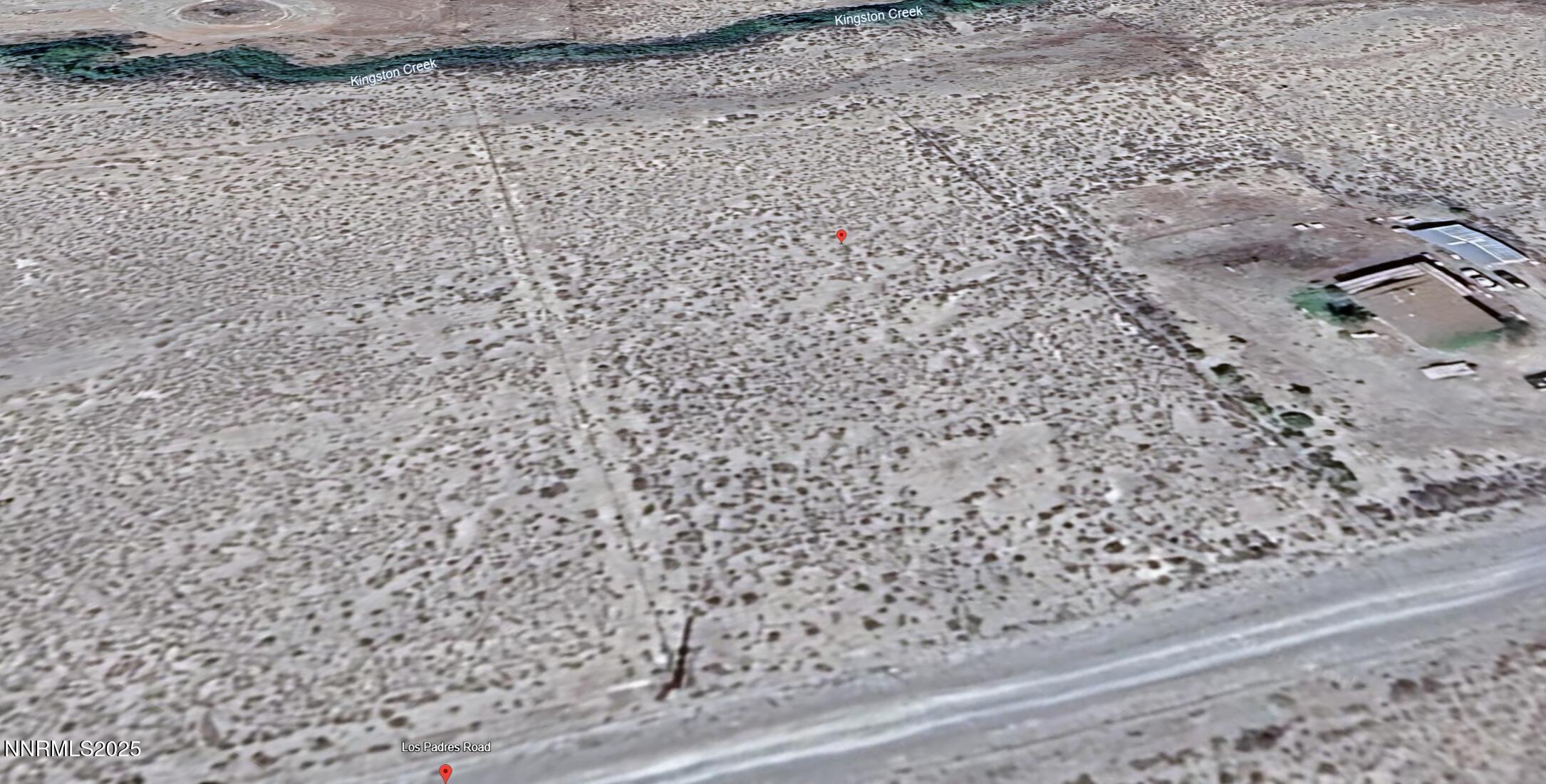 209 Los Padres Road Kingston, NV 89310 - Photo 3 of 6 a bathroom with a shower curtain