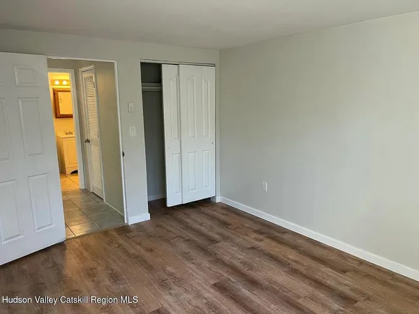 wooden floor in a hall with an entryway