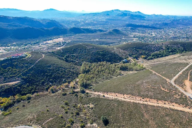 a view of a backyard with mountain view