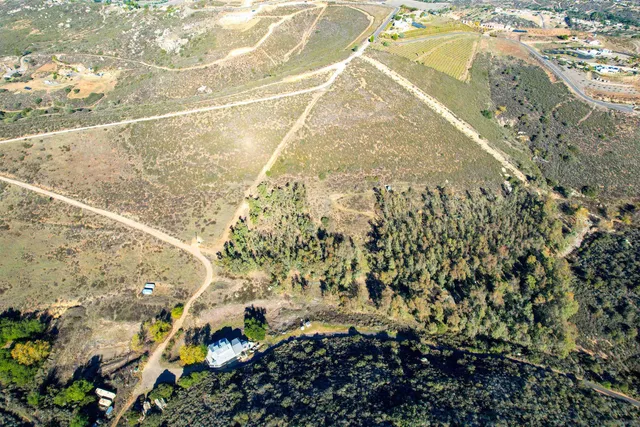 a view of a yard with an outdoor space