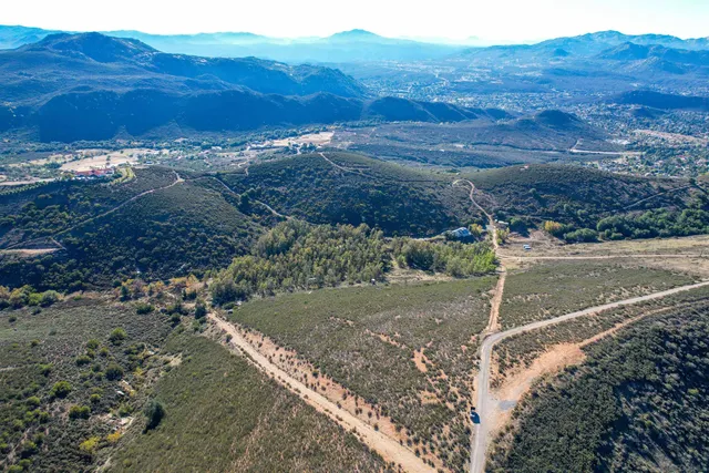 a view of a backyard with a mountain