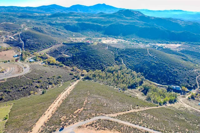 a view of a yard with an ocean